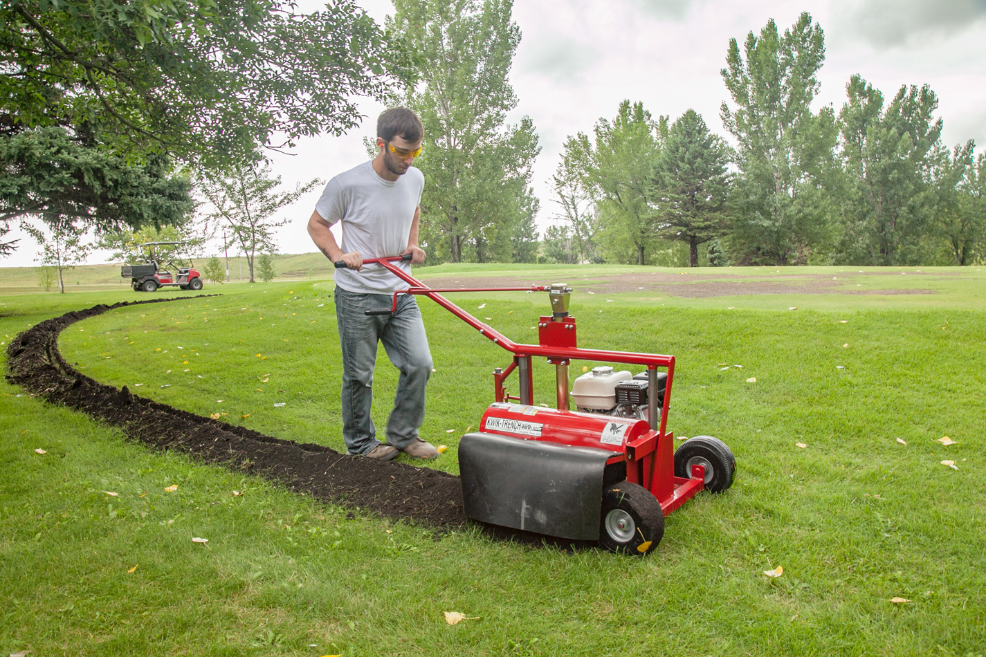 man digging trench