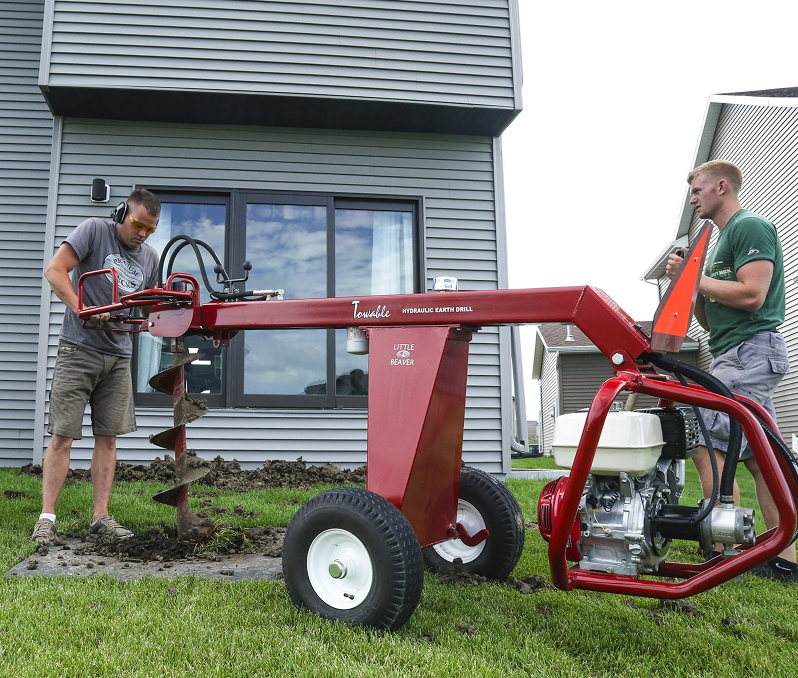 Post Hole Digger In Action by Little Beaver