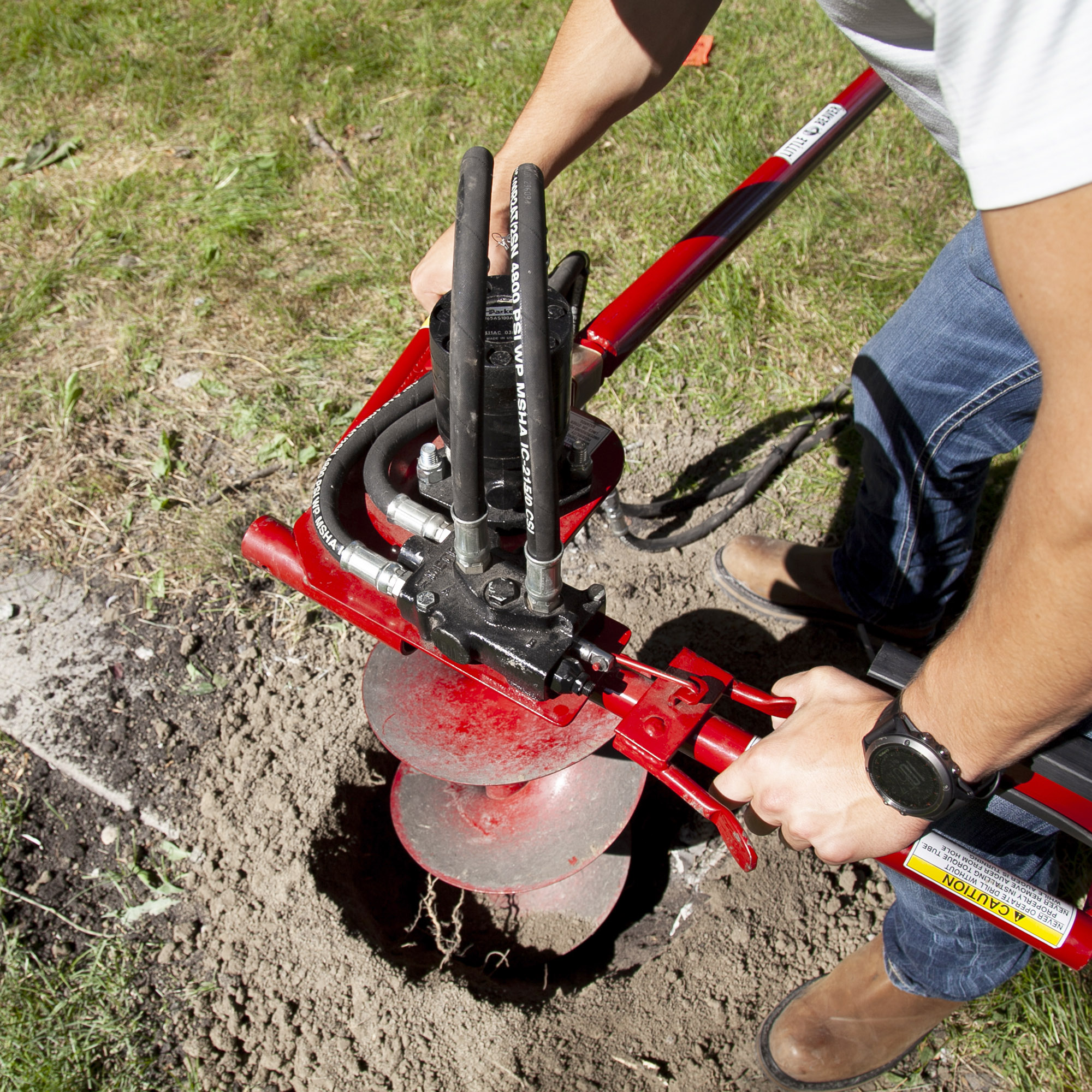 Installing Wooden Fence Posts With A Mechanical Earth Drill