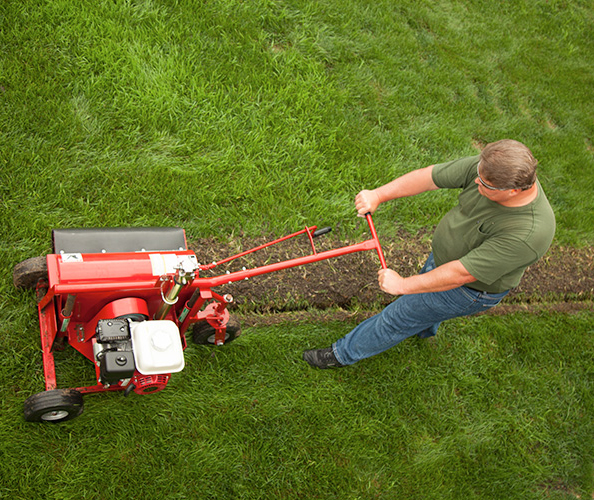 Kwik Trench Running On Lawn